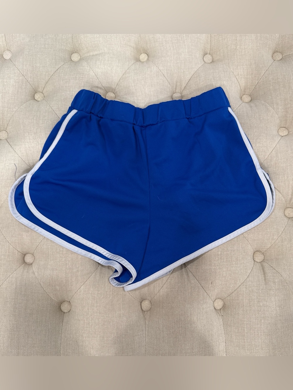 Blue Athletic Shorts with White Trim